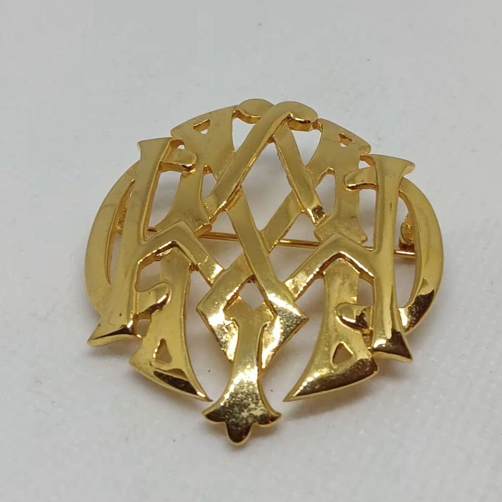 Elegant Gold Brooch